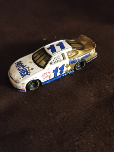1999 Racing Champions 1:24 scale diecast NASCAR #11 Paychex Ford Taurus driven by Brett Bodine