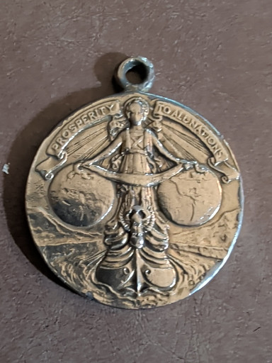 Bronze commemorative medal titled 'Panama Canal Completion Medal' issued by the Panama Canal Commission
