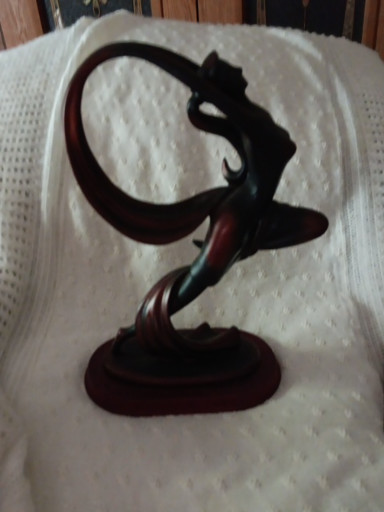 Bronze-colored resin sculpture titled 'Art Deco Dancer with Scarf' by Herco