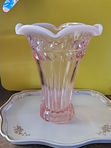 Pink opalescent glass vase with ruffled crimped edge and leaf detailing