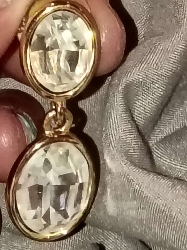 Gold-tone drop earrings with faceted oval clear crystals