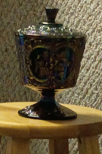 Carnival glass covered compote with grape and cable pattern by Fenton