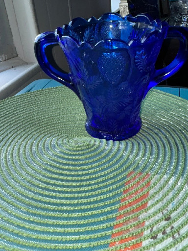 Cobalt blue pressed glass spooner with strawberry pattern by Mosser Glass