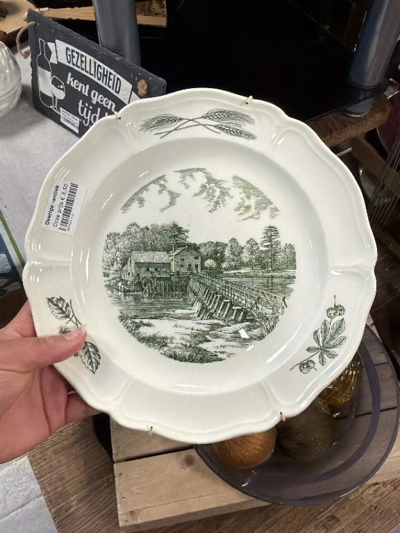 Ceramic commemorative plate with transfer-printed landscape scene by Wedgwood