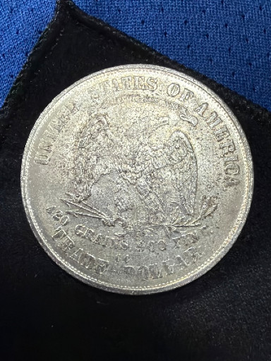 Moneda de plata de 25 centavos de Estados Unidos, conocida como 'Morgan Dollar' o 'Quarter Dollar'
