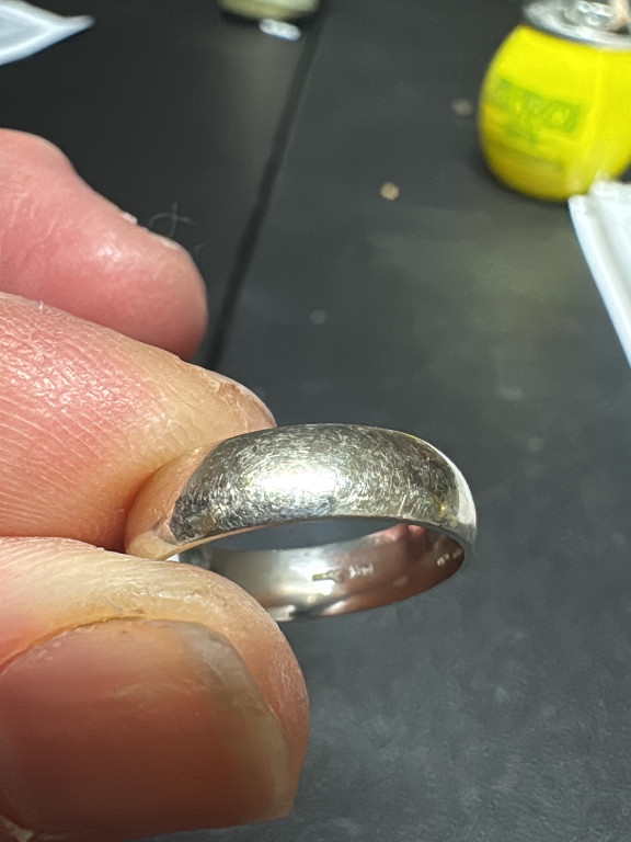 Sterling silver wedding band with brushed finish