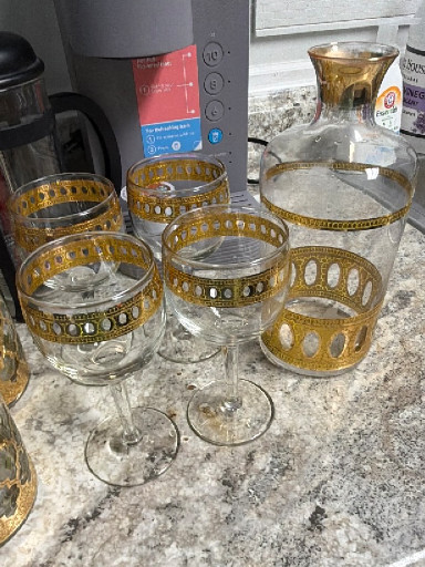 Glass barware set with 22-karat gold 'Antigua' pattern by Culver Ltd.