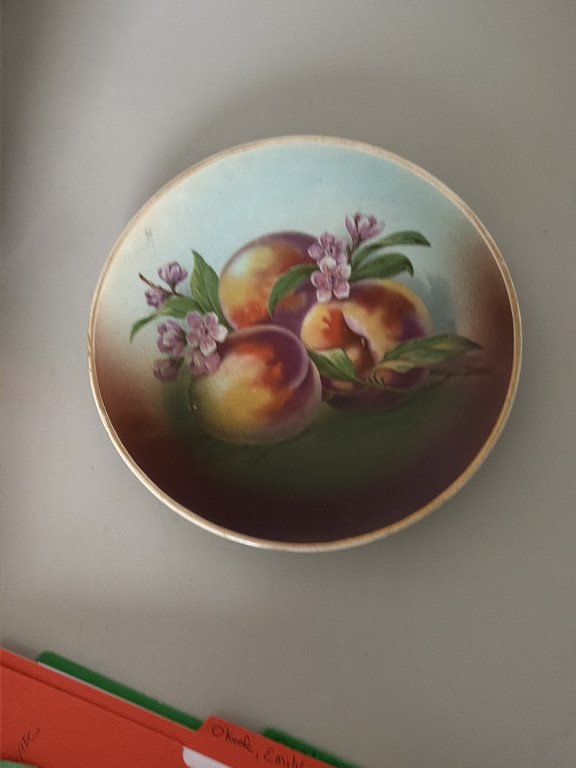 Hand-painted porcelain decorative plate with peach motif