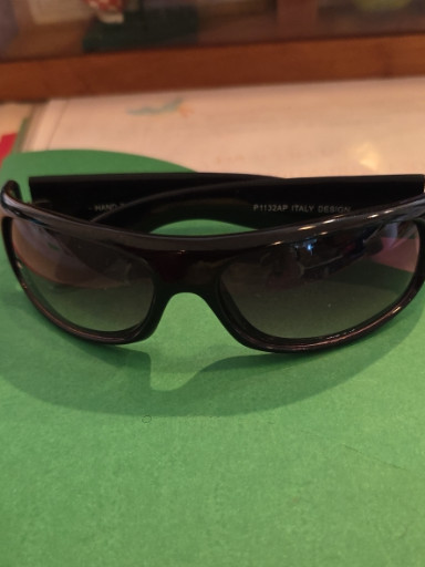 Black acetate sunglasses with gradient lenses, marked 'Italy Design'