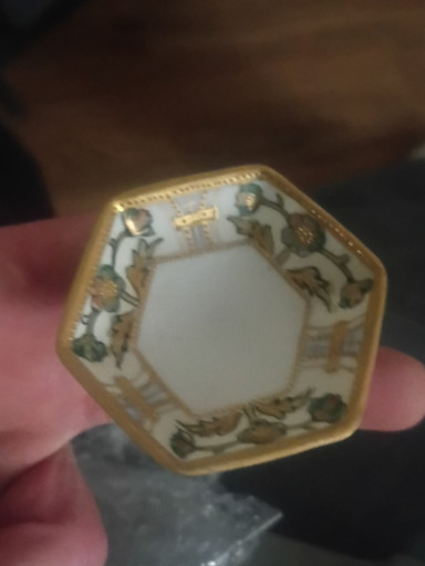 Porcelain octagonal dish with hand-painted floral decoration, likely Nippon