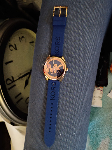 Michael Kors Janelle women's watch with blue silicone strap and rose gold-tone case