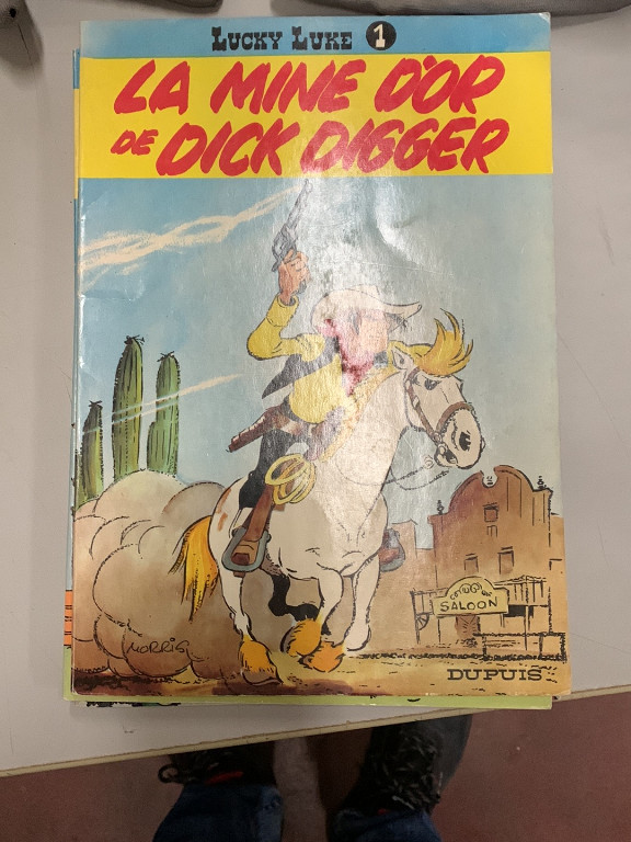 Bande dessinée 'La Mine d'or de Dick Digger' (Lucky Luke n°1) par Morris et René Goscinny, éditions Dupuis