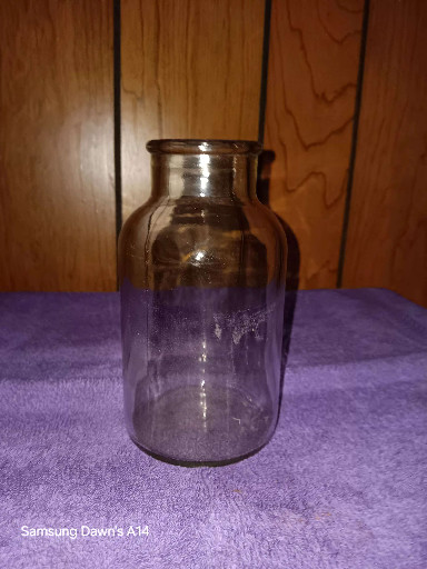 Vintage purple glass jar, circa early-to-mid 20th century