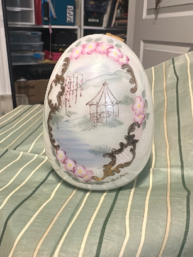 Hand-painted glass decorative egg with Asian gazebo scene by Fenton