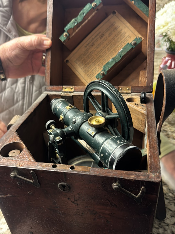 Antique surveyor's transit in original wooden case