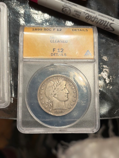 1899 Barber Half Dollar graded F-12 Details (Cleaned) by ANACS