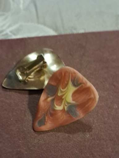 Resin earrings with marbled orange, yellow, and gray teardrop pattern