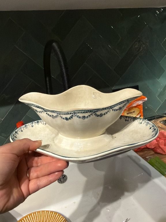 Ironstone gravy boat with blue transferware floral decoration