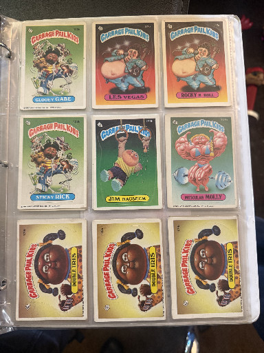 Collection of Garbage Pail Kids trading cards from the 1980s, including Series 1-4 cards