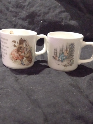 Porcelain mugs featuring Beatrix Potter's 'Peter Rabbit' illustrations by Wedgwood