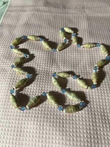 Vintage handmade necklace with brass tabular beads and blue glass spacers