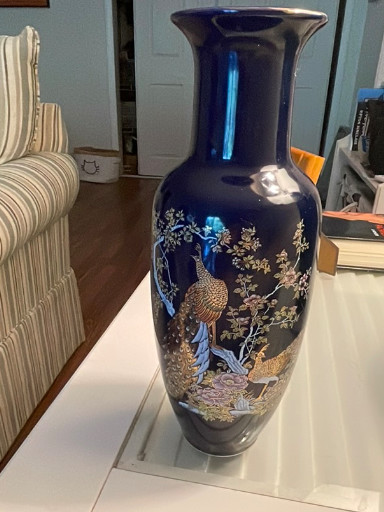 Porcelain vase with cobalt blue glaze and gold-painted peacock and floral decoration by Yamato Japan