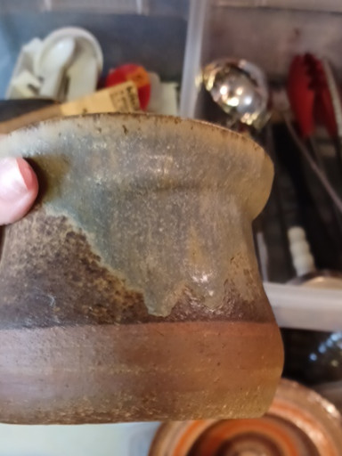 Studio pottery vase with earth-tone glaze