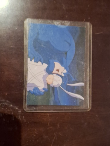 Vintage anime trading card featuring a character with blue hair