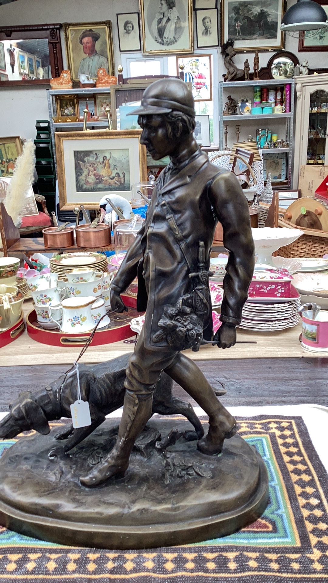 Bronze sculpture titled 'The Bloodhound Handler' after Pierre Jules Mène