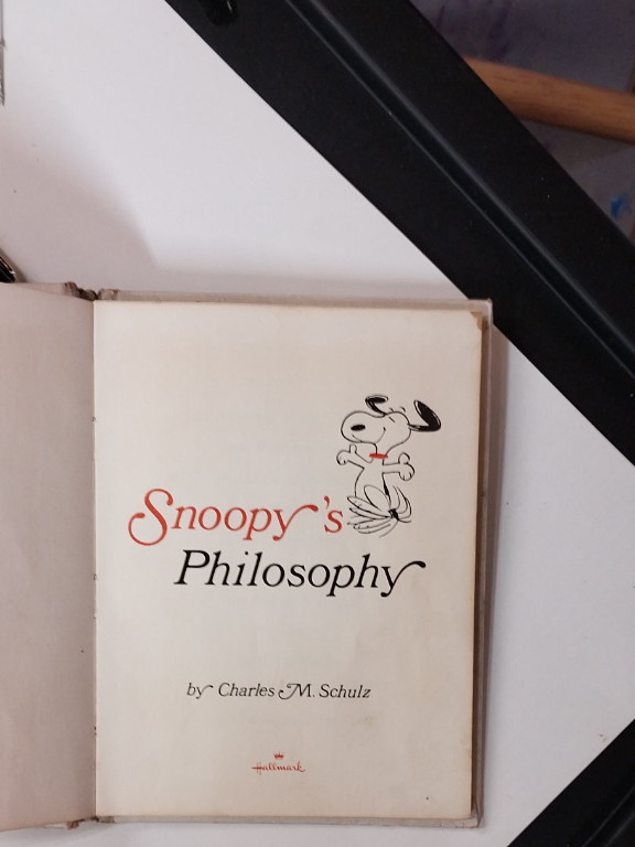 Book titled 'Snoopy's Philosophy' by Charles M. Schulz, published by Hallmark