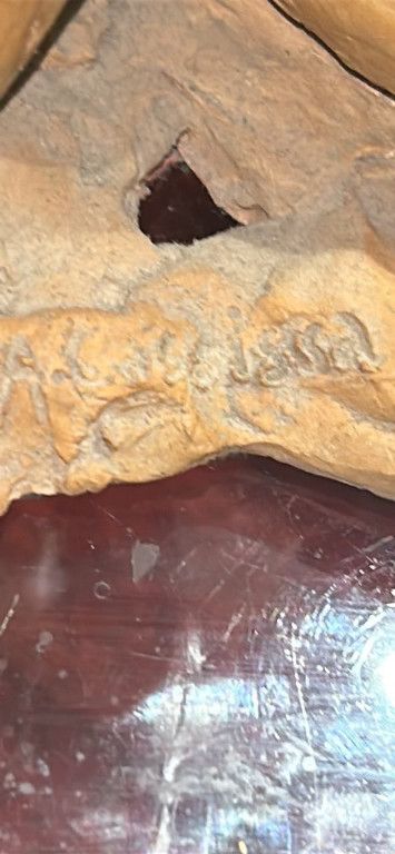 Scultura in terracotta raffigurante donna nuda pensierosa, firmata dall'artista