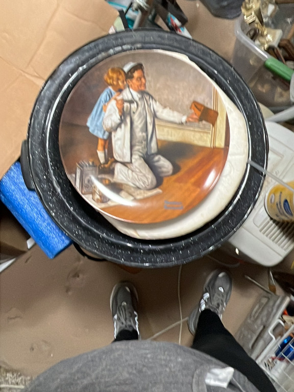 Porcelain collector plate titled 'The Painter' by Norman Rockwell