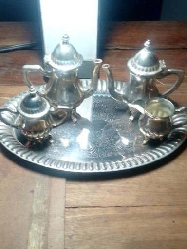 Silver-plated miniature tea and coffee service set on decorative tray