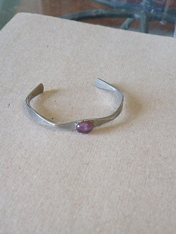 Sterling silver cuff bracelet with amethyst cabochon