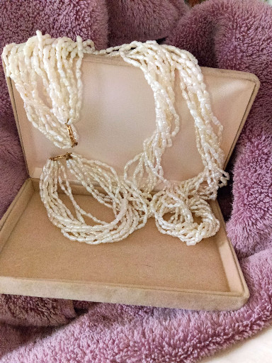 Multi-strand freshwater pearl necklace with 14K yellow gold clasp