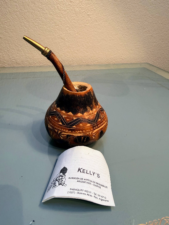 Hand-carved gourd mate cup with alpaca bombilla (straw), featuring fish design