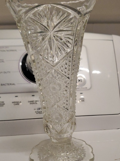 Pressed glass vase with starburst and diamond pattern
