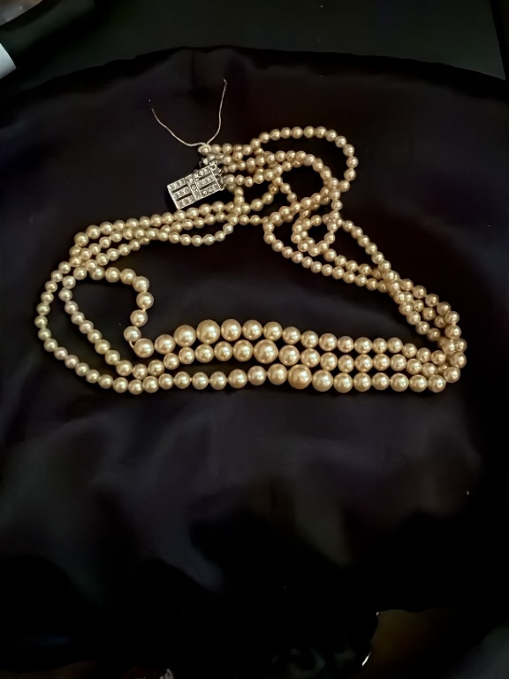 Multi-strand graduated pearl necklace with Art Deco-style white gold and diamond clasp