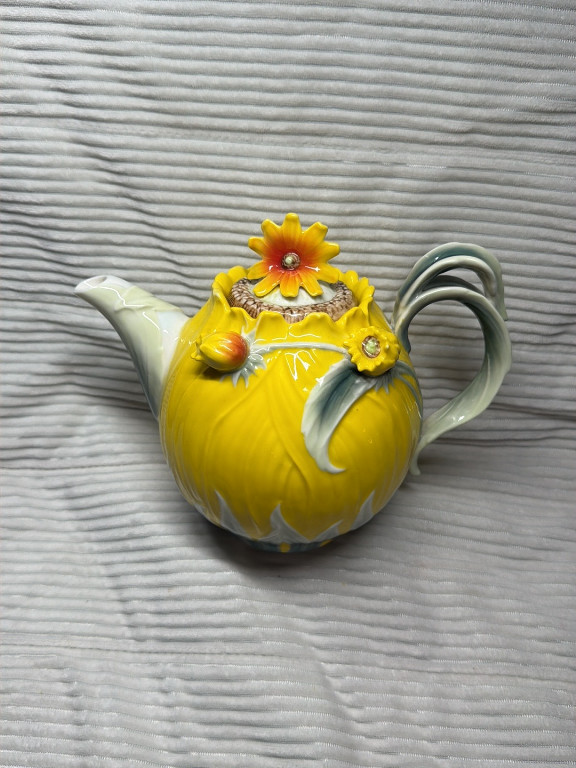 Porcelain teapot with sunflower and ladybug design by Sorelle