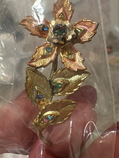 Vintage goldtone metal flower brooch with multicolor rhinestones