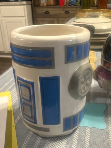 Ceramic sculpted mug depicting R2-D2 from Star Wars