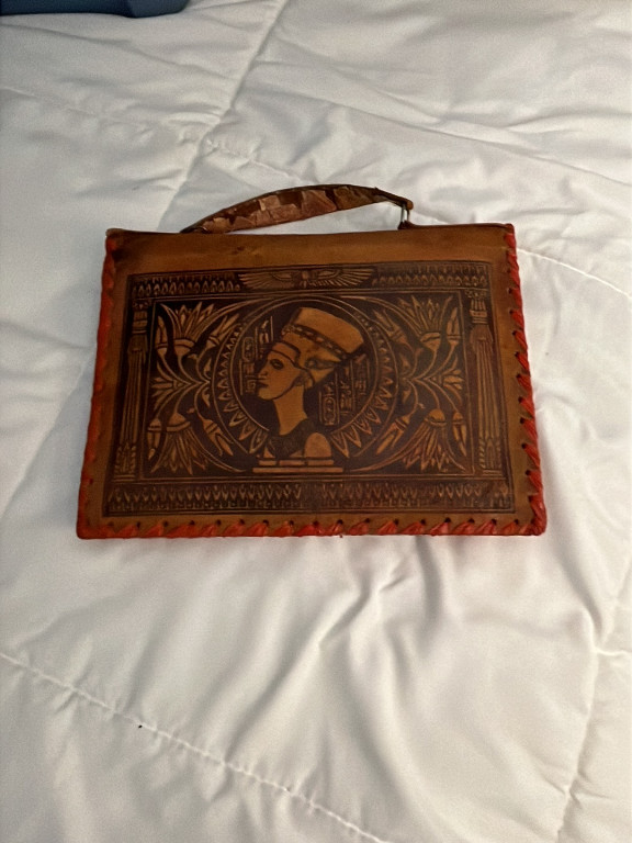 Tooled leather clutch purse featuring Queen Nefertiti design