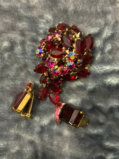Vintage rhinestone brooch with red and aurora borealis stones in gold-tone setting, circa 1960s