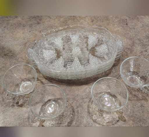 Clear pressed glass snack set with grape and vine pattern by Anchor Hocking