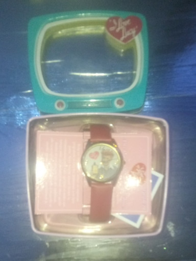 Licensed 'I Love Lucy' collectible watch with red leather band in retro TV-shaped display case