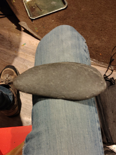 Stone grinding tool (mano) and metate fragment, Native American prehistoric artifact