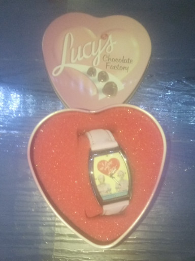 Avon 'I Love Lucy' wristwatch titled 'Lucy's Chocolate Factory' in heart-shaped tin