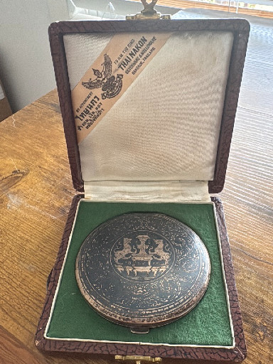Silver-plated round compact or trinket box with ornate crown and decorative engraving