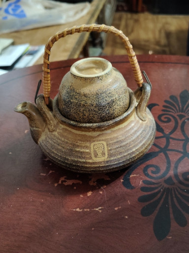 Stoneware teapot with rattan handle, Japanese pottery