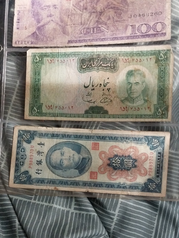 Collection of vintage banknotes from Mexico, Iran, and China